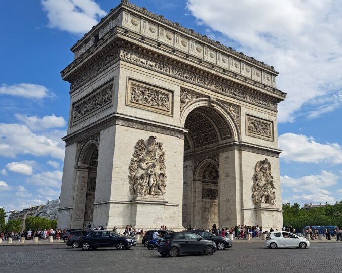 cycling around the Arc de Triomphe on the London to Paris bike ride