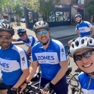 Cyclists enjoying the sunshine while cycling from London to Amsterdam on an organised London to Amsterdam cycle event by the company European Cycling Tours