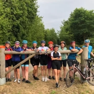 cyclists taking a break while cycling from London to Paris down the Avenue Verte through beautiful Normandy