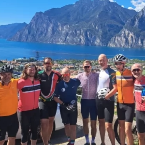 Cyclists above lake Garda while cycling from Munich to Venice on one the incredible cycling holidays in Europe with European Cycling Tours