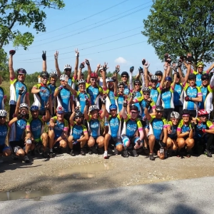 Group of cyclists celebrating cycling in Europe while on a supported cycling event with cycle tour operator European Cycling Tours