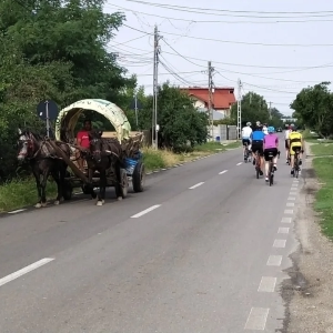 Cyclists riding bikes through the peaceful unspoilt country of Romania while cycling to the Transfagarasan on the organised cycling holiday by European Cycling Tours