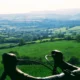 Panoramic view of cyclists riding through the english countryside on a guided coast to coast bike ride
