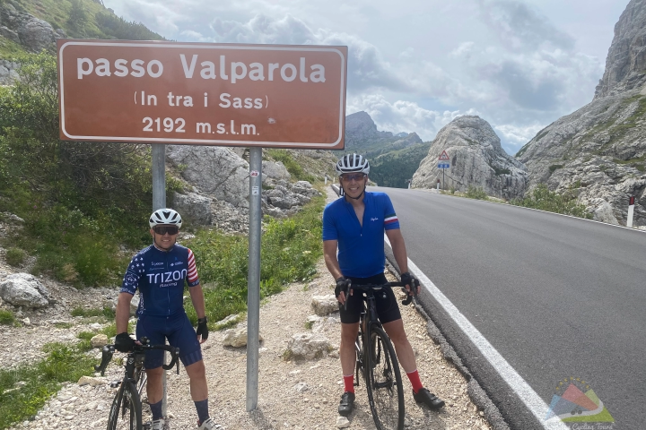 Group of cyclists ascending the final ramp of the Passo Valparola pass in Italy during a European Cycling Tours holiday