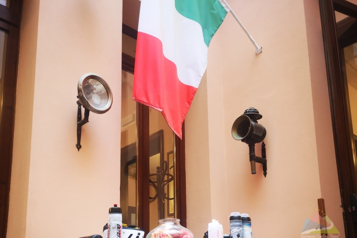 Cycling memorabilia and an Italian flag on display at a premium cycling-themed hotel; view our full range of Italian cycling itineraries.