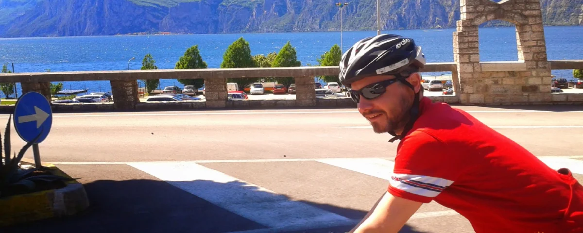 A cyclist riding along the spectacular winding roads of the dalmatian coast during a guided tour of croatia read our comprehensive guide to the ultimate adriatic cycling holiday