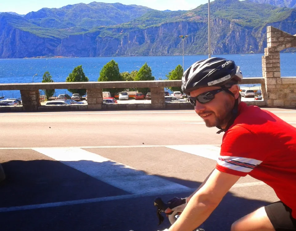 A cyclist riding along the spectacular winding roads of the Dalmatian coast during a guided tour of Croatia; read our comprehensive guide to the ultimate Adriatic cycling holiday.