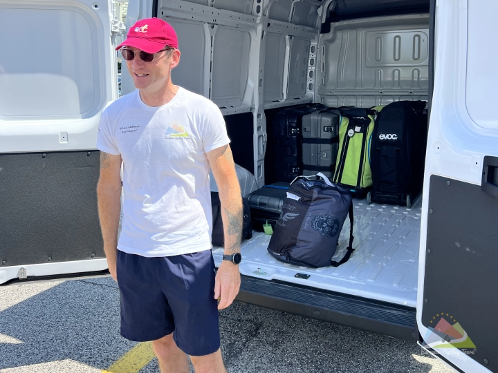 Professional support van logistics provided by European Cycling Tours, showing luggage handling and rider assistance during a multi-day guided cycling expedition.